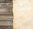 Old paper on the wood background