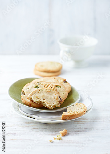 Photo: Butter cookies with pistachios on a plate Butter cookies with pistachios on a plate