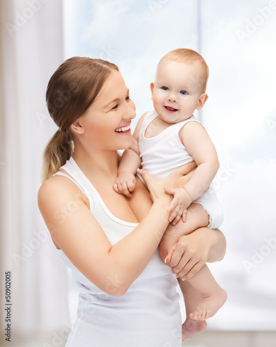 Photo: happy mother with adorable baby happy mother with adorable baby