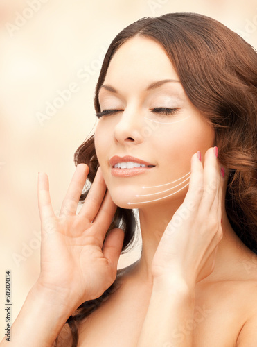 Photo: face and hands of beautiful woman face and hands of beautiful woman