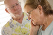 Senior Adult Male Consoles Sad Senior Adult Female