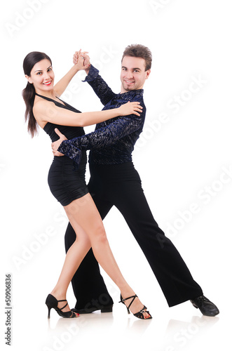 Photo: Pair of dancers isolated on the white Pair of dancers isolated on the white