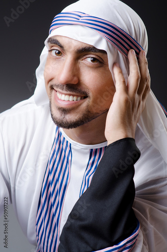 Photo: Arab businessman isolated on the white Arab businessman isolated on the white