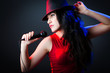 Female performer at disco with mic