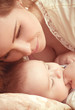 Young happy mother with baby