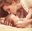Young happy mother with baby