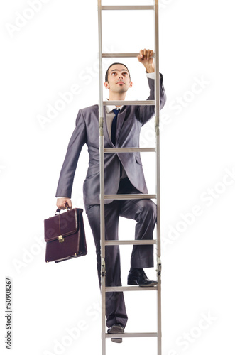 Photo: Businessman climbing the ladder isolated on white Businessman climbing the ladder isolated on white