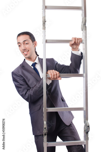 Photo: Businessman climbing the ladder isolated on white Businessman climbing the ladder isolated on white