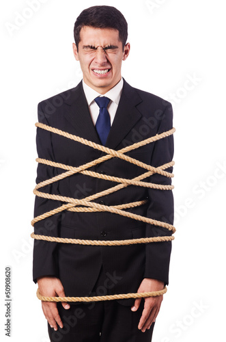 Photo: Businessman tied up with rope on white Businessman tied up with rope on white