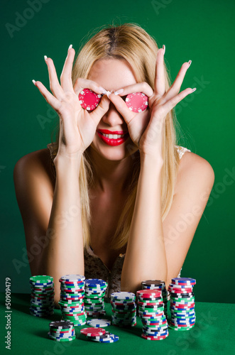 Photo: Woman in casino playing cards Woman in casino playing cards