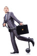 Businessman with shackles on white
