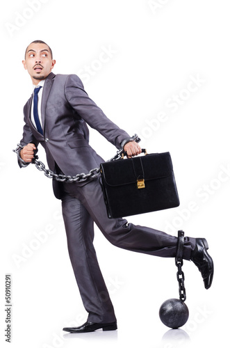Photo: Businessman with shackles on white Businessman with shackles on white