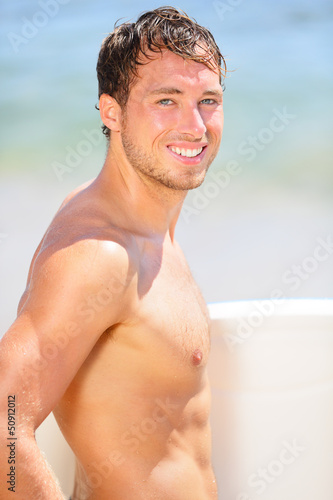 Photo: Surfer beach man portrait Surfer beach man portrait