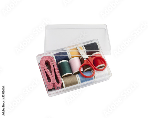 Photo: mini sewing set in plastic box isolated on white background mini sewing set in plastic box isolated on white background