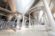 Equipment for the brewery. Large tanks and shiny tubes.