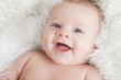 Photo: Portrait of a smiling baby close-up. Portrait of a smiling baby close-up.