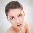 Photo: young woman's face with healthy clean skin young woman's face with healthy clean skin