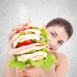 Photo: woman giving us a huge sandwich woman giving us a huge sandwich