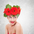 Photo: woman with red gerbera flowers on her head woman with red gerbera flowers on her head