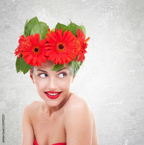 Photo: woman with red gerbera flowers on her head woman with red gerbera flowers on her head