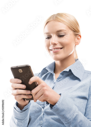 Photo: Close up of blonde woman using smart phone Close up of blonde woman using smart phone