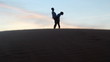 Video: Loving couple hiking in the desert Loving couple hiking in the desert