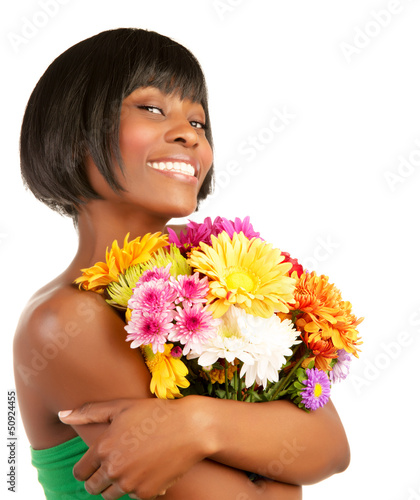 Photo: Happy woman holding flowers Happy woman holding flowers