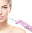 Beautiful woman gets an injection in her face isolated on white