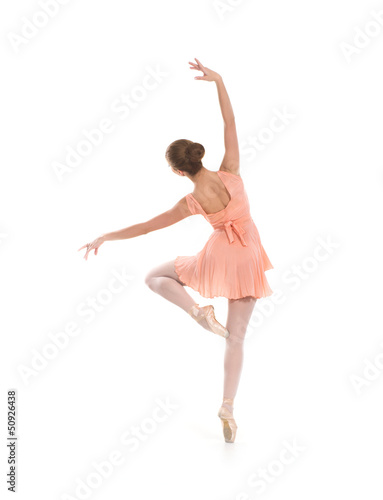 Photo: Young beautiful ballet dancer isolated over white background Young beautiful ballet dancer isolated over white background
