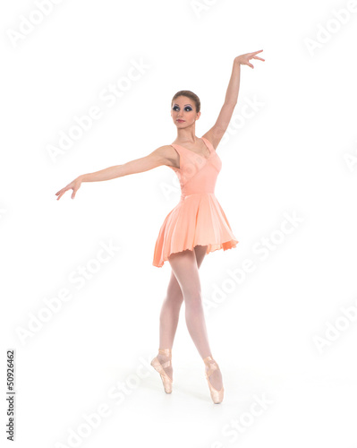 Photo: Young beautiful ballet dancer isolated over white background Young beautiful ballet dancer isolated over white background