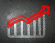 Chalk drawing of an increase in the stock market.