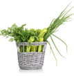 fresh green vegetables in basket isolated on white