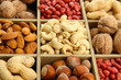 assortment of tasty nuts in  wooden box, close up