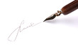 Closeup of signature (fake, not real) and ink pen, isolated