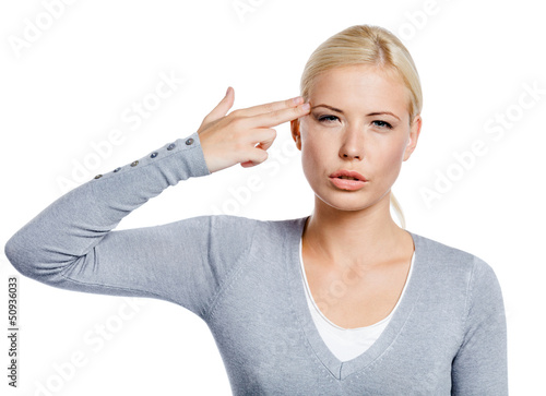 Photo: Woman hand gun gesturing, isolated on white Woman hand gun gesturing, isolated on white