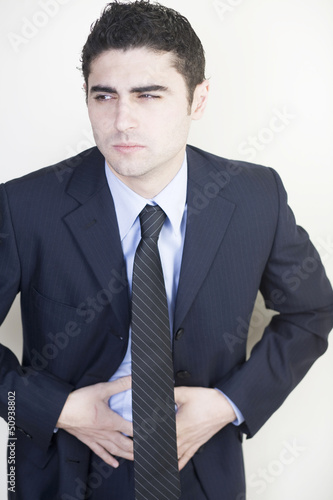 Photo: Businessman mit Bauchschmerzen Businessman mit Bauchschmerzen