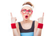Surprised fitness woman gesturing finger up