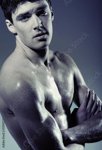 Photo: Muscular young man without T-shirt Muscular young man without T-shirt