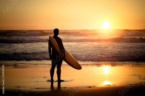 Photo: Surfer watching the waves Surfer watching the waves