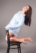 Photo: Young elegant woman on chair Young elegant woman on chair