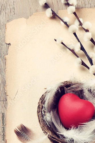 Photo: Vintage frame with red heart Vintage frame with red heart
