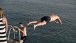 Man jumping into water, super slow motion, shot at 240fps