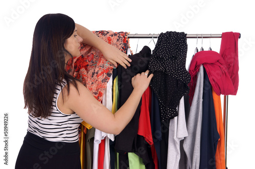 Photo: Young woman in the store while shopping Young woman in the store while shopping