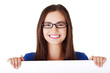 Portrait young happy woman with blank board