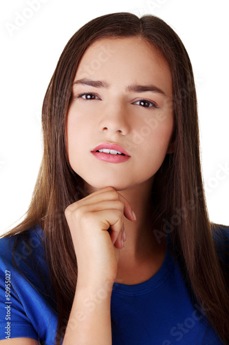 Photo: Beautiful girl is standing and wondering. Beautiful girl is standing and wondering.