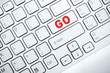 computer keyboard with red button