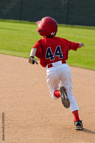 Photo: baseball boy running bases baseball boy running bases