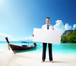 Foto: man on the beach of Thailand whith empty board in hand man on the beach of Thailand whith empty board in hand