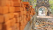 stack of red brick  in perspective focus changes .