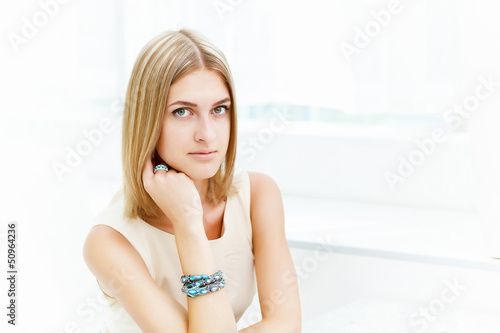 Photo: Young woman in cafe Young woman in cafe